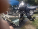 2006 1448 Fisher aluminum boat w/ 25 hp 4 Stroke motor.
