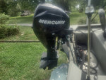 2006 1448 Fisher aluminum boat w/ 25 hp 4 Stroke motor.