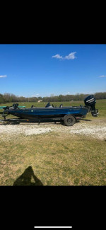 1999 Champion 187 with a 2013 Mercury Optimax. Super clean.