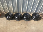 FOUR 14"X5.5" FACTORY 14 HOLE STOCK BLACK STEEL WHEELS--OS