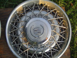 lot of 3 - 1975 to 1985 Cadillac Wire Spoke Wheel Covers Hubcaps