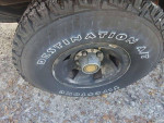 1996 FORD F150 WHEELS AND NEW TIRES.
