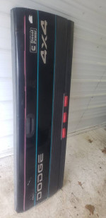 DODGE RAM TAIL GATE 1994 - 2001 COMPLETE LAST PIC. SHOWS DING IN GATE