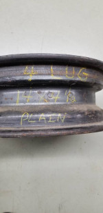 one 14" X 4.5" four lug 4.5" bolt circle FoMoCo steel wheel 5MC date