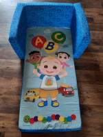 Cocomelon toys, couch.
