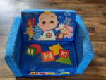 Cocomelon toys, couch.