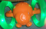 Bright Starts Roll and Glow Monkey Crawling Baby Toy