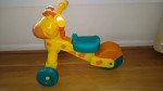 Little Tikes riding Giraffe
