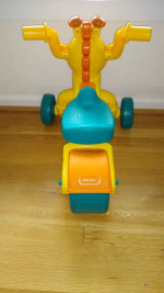 Little Tikes riding Giraffe
