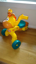 Little Tikes riding Giraffe