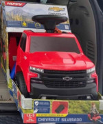 Red Huffy 6V Chevy Silverado Truck Ride-on for kids