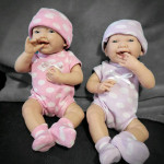 Vinyl baby doll boy and girl set