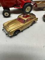 2 Tractors, 2 Cars, And A Trailer
