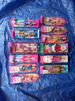 11 older Barbie dolls 12 in tall