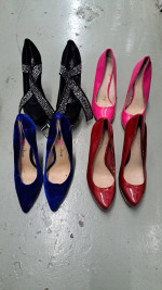 11 pairs of female shoes plus kids boots