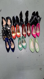 11 pairs of female shoes plus kids boots