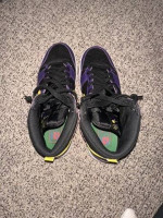 2 pairs of Nike basketball shoes: size 11.5 and 11