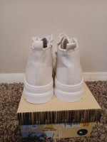 Unworn white shoes