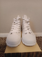 Unworn white shoes
