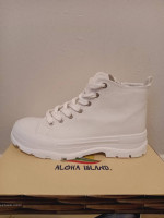 Unworn white shoes