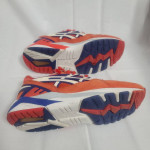 Orange women Asics running shoes 6.5 women