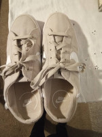 NIKE Cream slip on shoes size 11