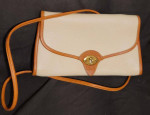 Beige and Light Brown All Weather Dooney & Bourke Leather Medium Bag