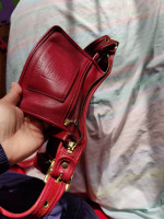 Authentic Coach cross body bag(material is hide)