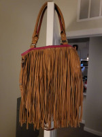 Fringe handle bag with shoulder strap
