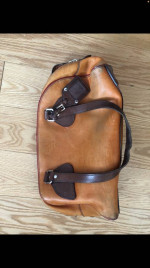 Prada - Rare Bowler BagColor: Orange / Red / Brown Material: Distresse