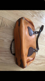 Prada - Rare Bowler BagColor: Orange / Red / Brown Material: Distresse