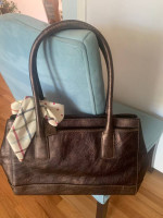 Coach brown leather bag with a bow