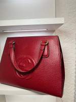 Red Gucci Leather travel bag