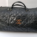 Large Chanel CC style leather duffle travel bag