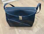 Travel bag purse with key
