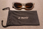 Ladies silver glitter sunglasses, in a-morir bag.