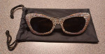 Ladies silver glitter sunglasses, in a-morir bag.