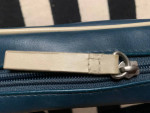 Blue vinyl shoulder bag zipper closure with pockets