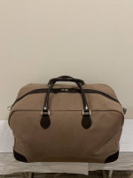 LARGE, HEAVY-DUTY BROWN CANVAS CARRY-ON