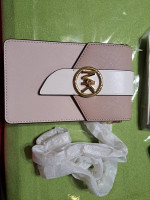 Brand new Michael Kors Crossbody and card holder on back of bag
