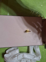 Brand new Michael Kors Crossbody and card holder on back of bag