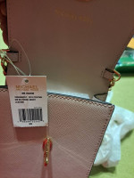 Brand new Michael Kors Crossbody and card holder on back of bag