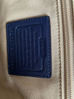 Coach Navy zipper bag with yellow tassel
