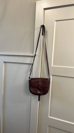 Kate Spade New York Knott Pebbled Leather Medium Saddle Crossbody - Li