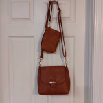 Purse and small matching cosmetics bag, new condition