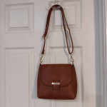 Purse and small matching cosmetics bag, new condition