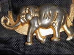Black Purse with Decorative Gold Elephant