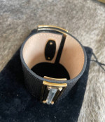 Leather black strap with gold details Carolee Luces bracelet