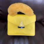 Yellow LOUIS VUITTON bag used, no damages.