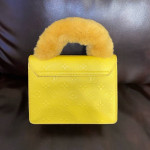 Yellow LOUIS VUITTON bag used, no damages.